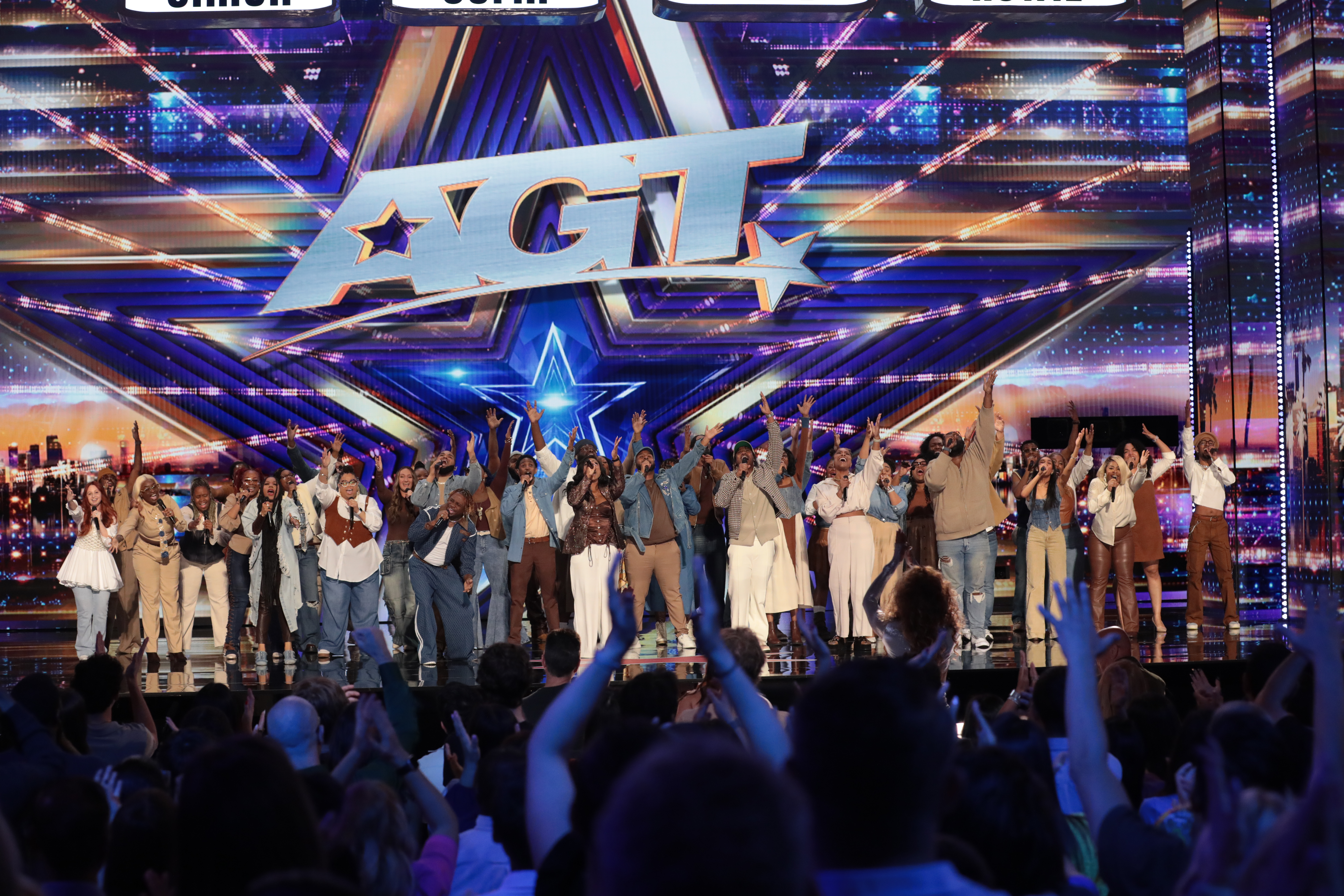 The CommUNITY ATL Choir on stage